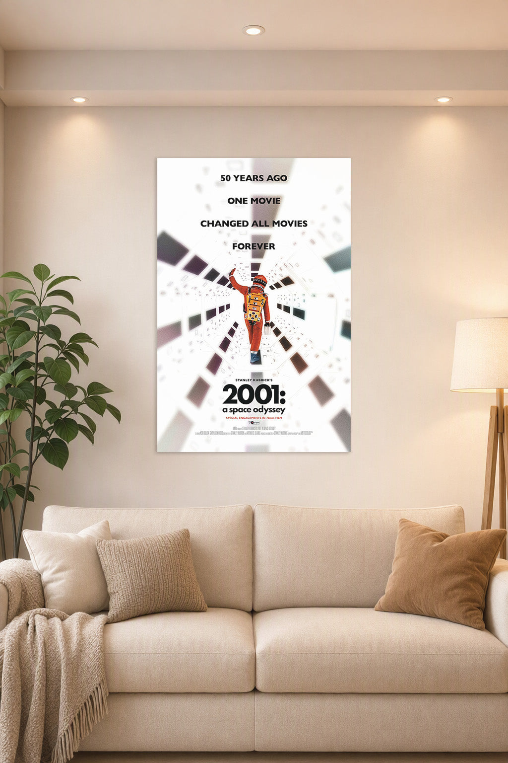 2001: A Space Odyssey Movie Poster in a bright living room above a beige sofa.