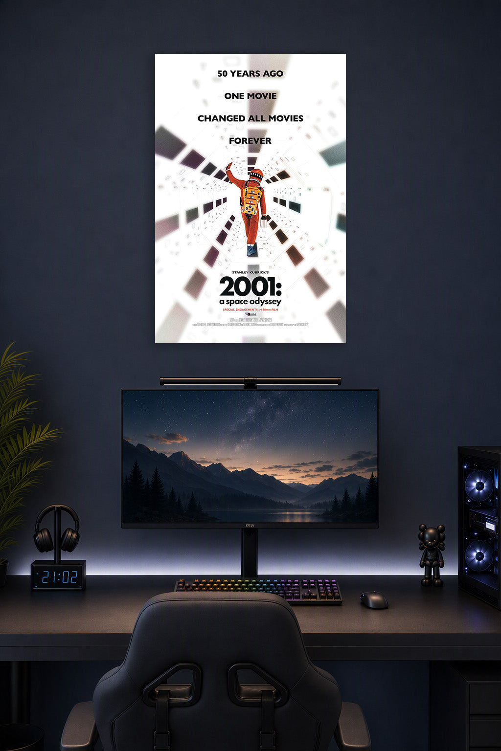 2001: A Space Odyssey Movie Poster in a gaming desk setup above a monitor.