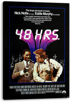 48 Hrs. canvas wall art print displays Eddie Murphy with handcuffs and Nick Nolte in front of purple buildings and a night skyline.