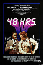 48 Hrs. movie poster features Eddie Murphy holding handcuffs beside Nick Nolte with a holstered gun under a purple cityscape.
