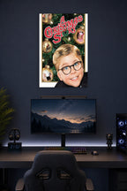 A Christmas Story in a gaming desk setup above a monitor.