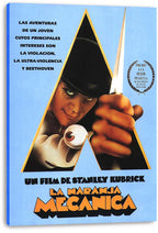 A Clockwork Orange canvas wall art print displays Alex DeLarge with a cane inside a bold black A, Spanish text, and blue background.