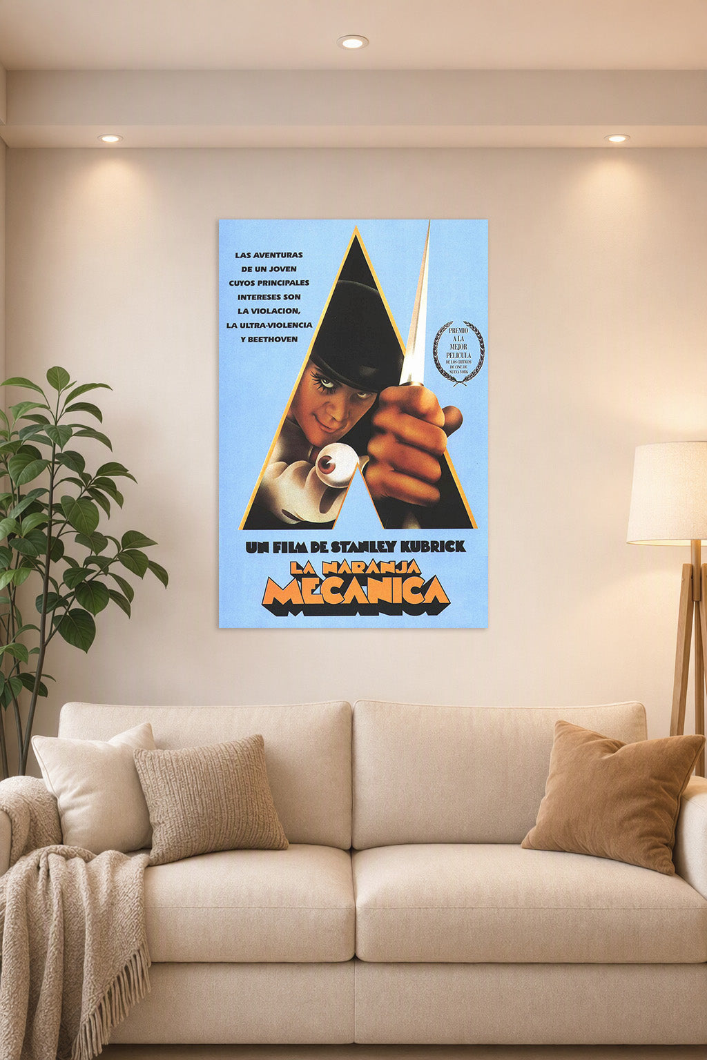 A Clockwork Orange Alex DeLarge in a bright living room above a beige sofa.