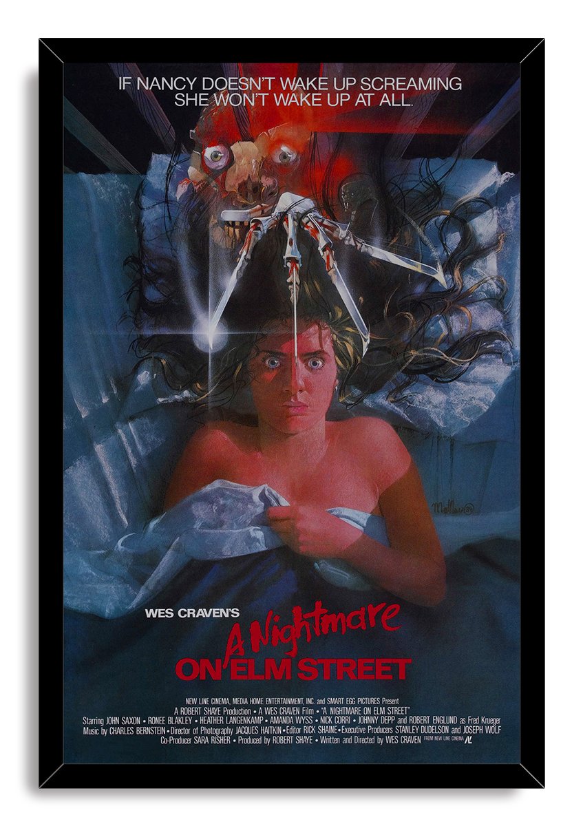 A Nightmare on Elm Street framed wall art print depicts Nancy clutching sheets beneath Freddy Krueger and a razor glove in a black frame.
