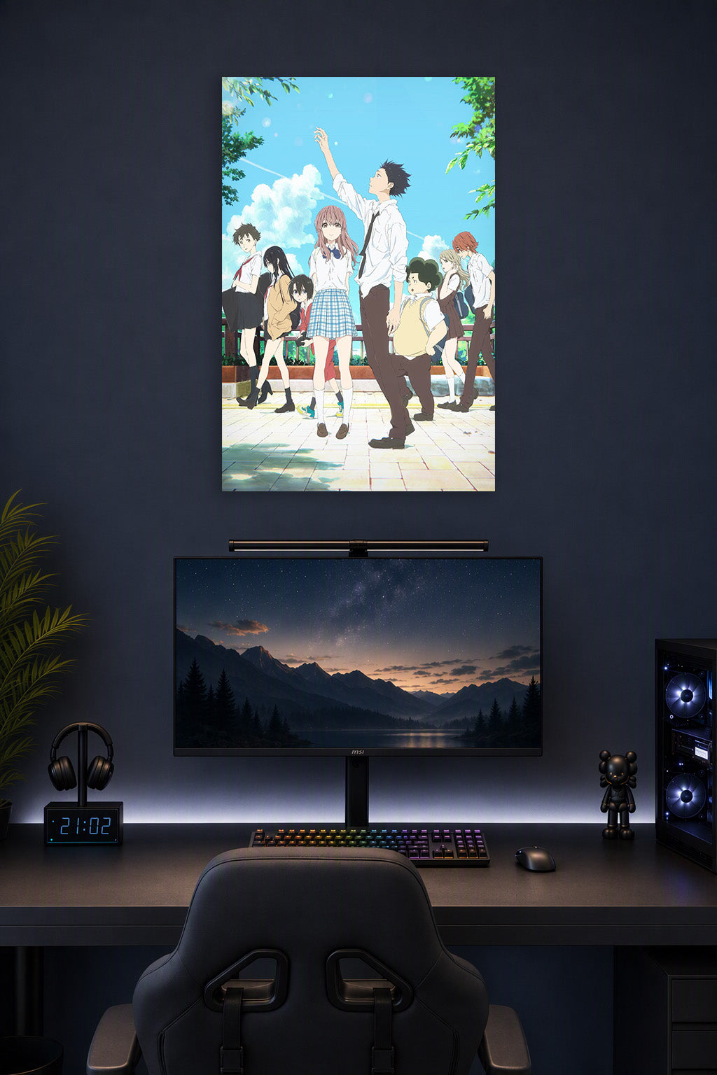 A Silent Voice Anime Movie Characters in a gaming desk setup above a monitor.