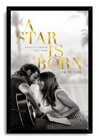 A Star Is Born framed wall art print with Bradley Cooper and Lady Gaga seated together, a guitar and sheet music in black and white.