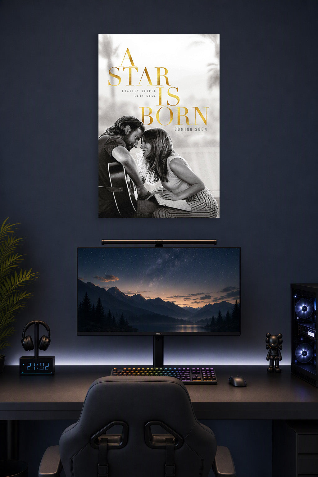 A Star Is Born Bradley Cooper Lady Gaga in a gaming desk setup above a monitor.