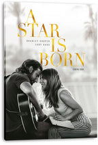 A Star Is Born canvas wall art print featuring gold typography and a grayscale couple seated close with an acoustic guitar.