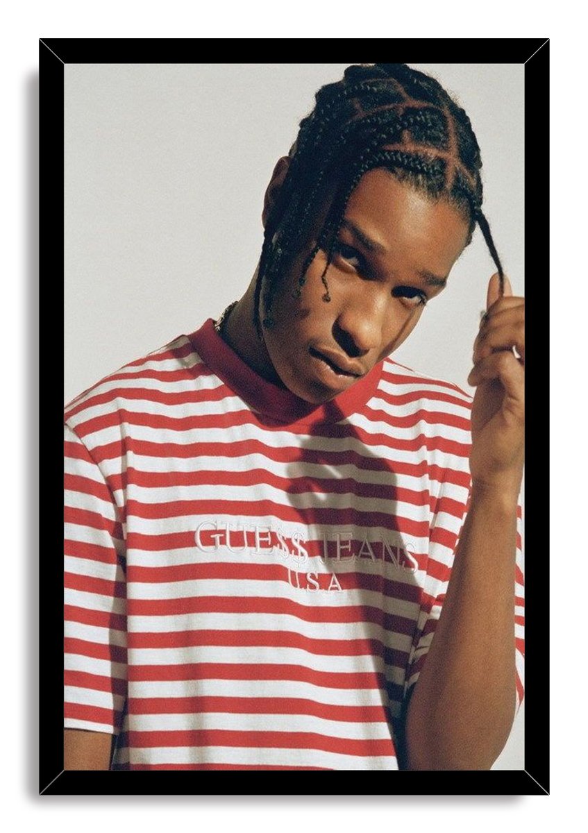 A$AP Rocky framed wall art print with a black border, portraying him holding a braid in a red and white striped shirt.