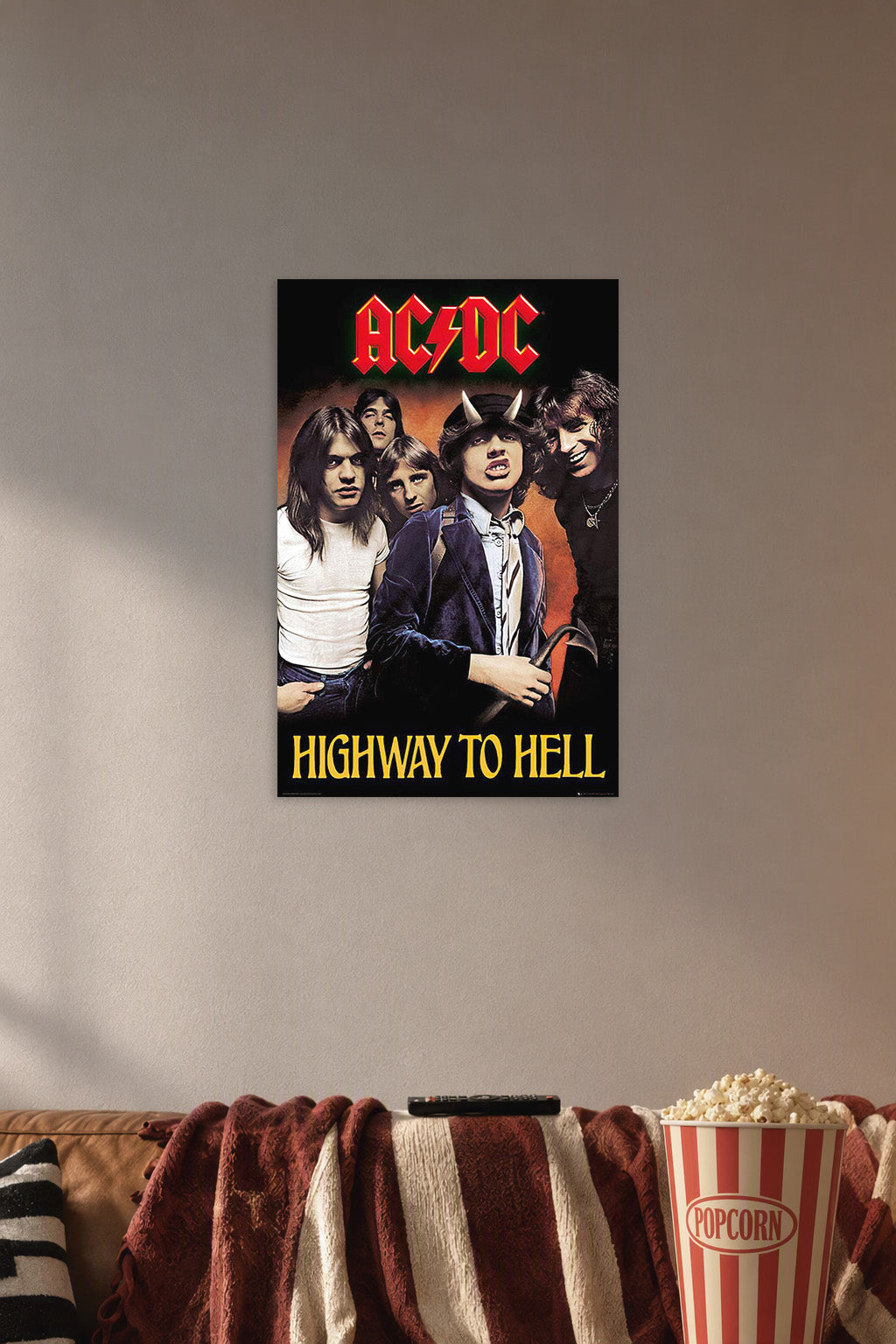 AC/DC-Highway To Hell Music in a cozy movie room above a brown sofa with popcorn.