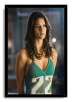 Adrianne Palicki framed wall art print portrays her in a green number 22 jersey, surrounded by a glossy black frame.