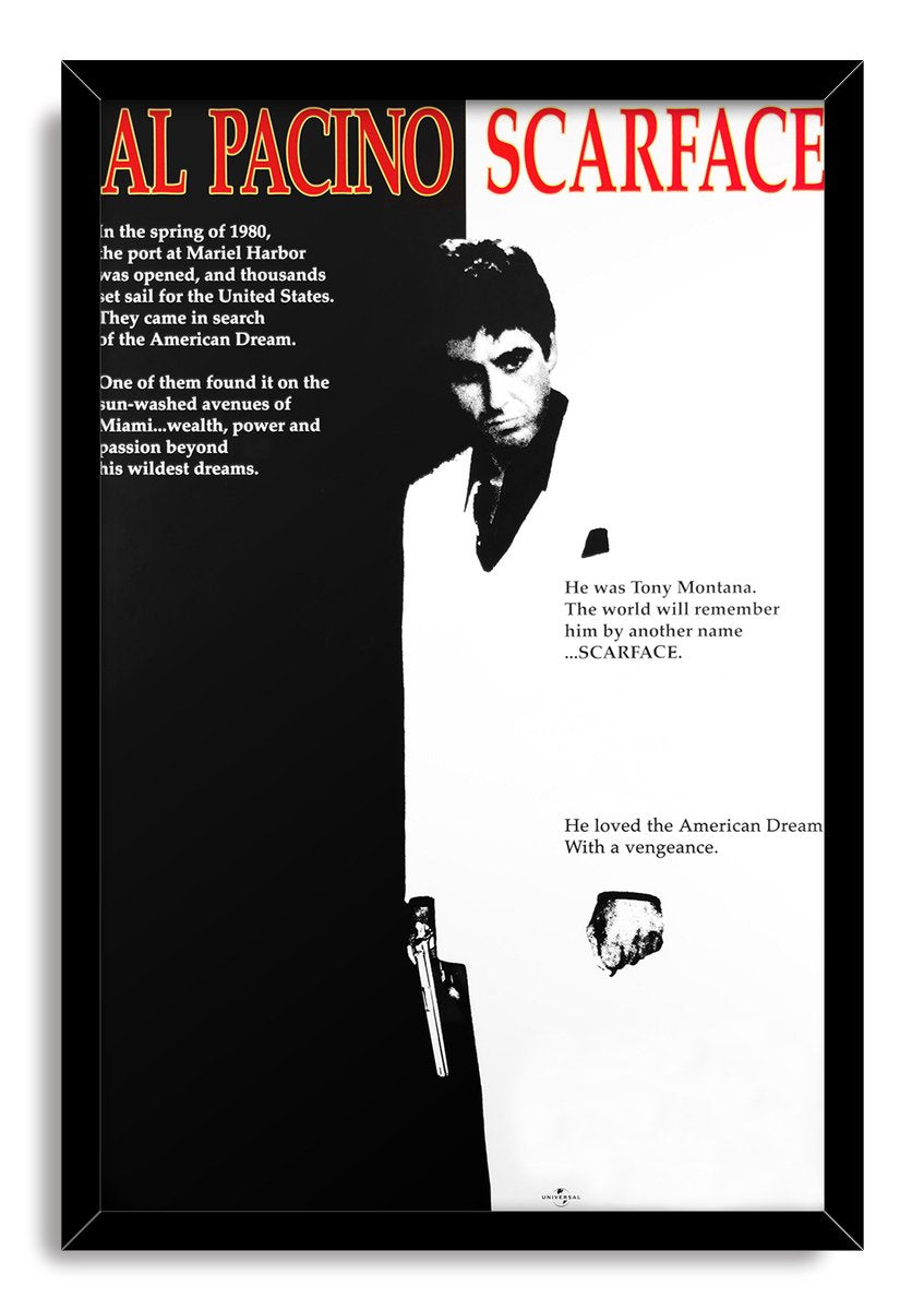 Scarface framed wall art print presents Tony Montana’s black-and-white silhouette, a handgun, film text, and red Al Pacino title lettering.