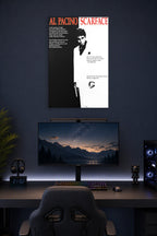 Al Pacino Scarface Tony Montana in a gaming desk setup above a monitor.