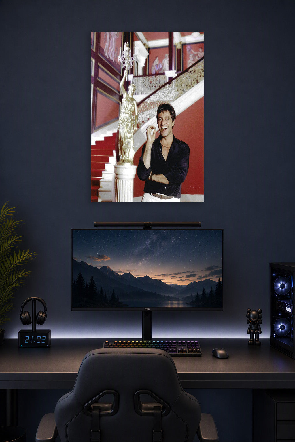 Al Pacino Scarface Tony Montana in a gaming desk setup above a monitor.