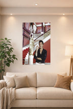 Al Pacino Scarface Tony Montana in a bright living room above a beige sofa.