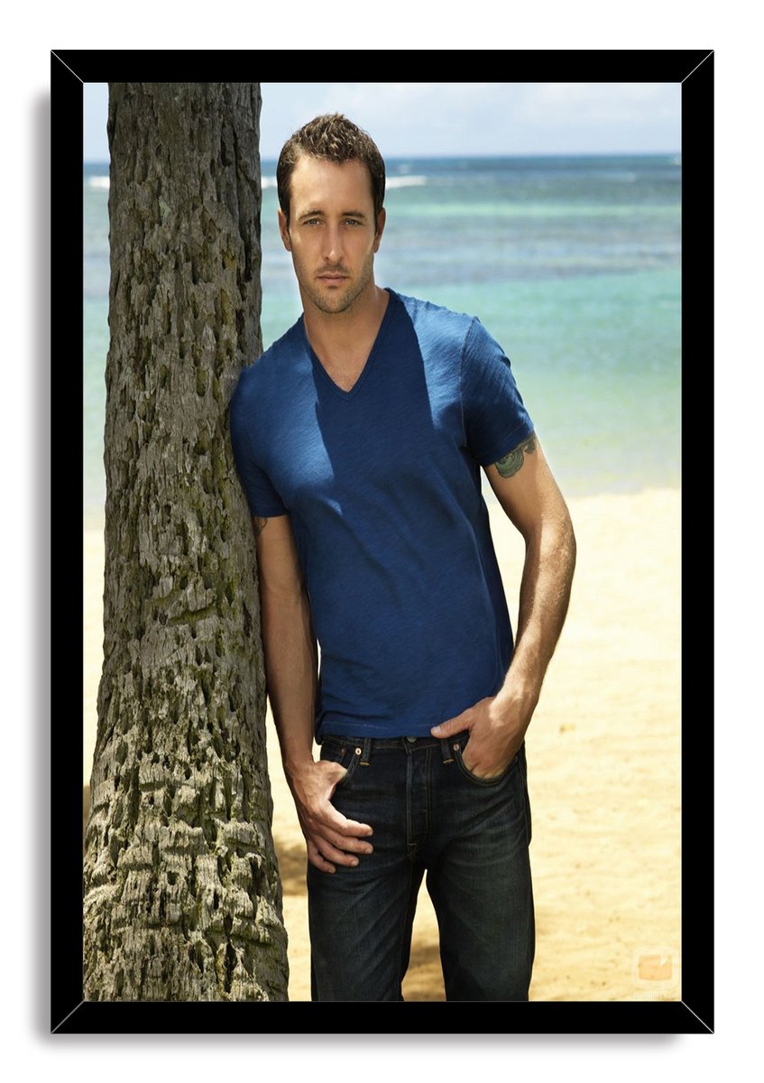 Alex O'Loughlin framed wall art print presents the actor in dark jeans and a blue shirt against a tropical shoreline.
