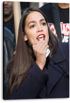Alexandria Ocasio-Cortez wall art print on stretched canvas portrays her speaking into a microphone in a navy coat.