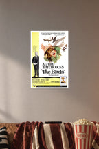 Alfred Hitchcock's The Birds Movie Poster in a cozy movie room above a brown sofa with popcorn.