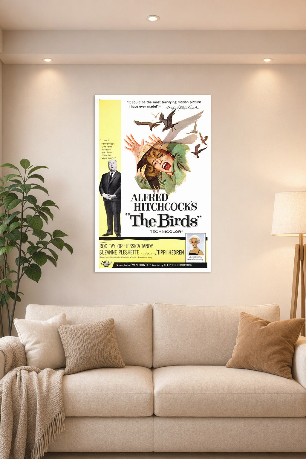 Alfred Hitchcock's The Birds Movie Poster in a bright living room above a beige sofa.