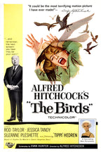 The Birds movie poster wall art print features a screaming woman in green under attacking black birds, beside Alfred Hitchcock.