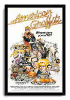 American Graffiti framed wall art print in a black frame, featuring a retro collage of characters, classic cars, diner details, and orange cruiser.