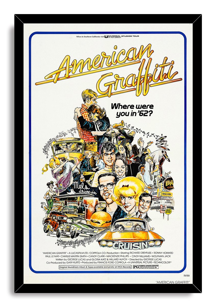 American Graffiti framed wall art print with a black border, yellow title lettering, illustrated characters, diners, and cruising cars.