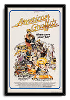 American Graffiti framed wall art print in a black frame, with retro cast portraits, cruising cars, musicians, and blue border.