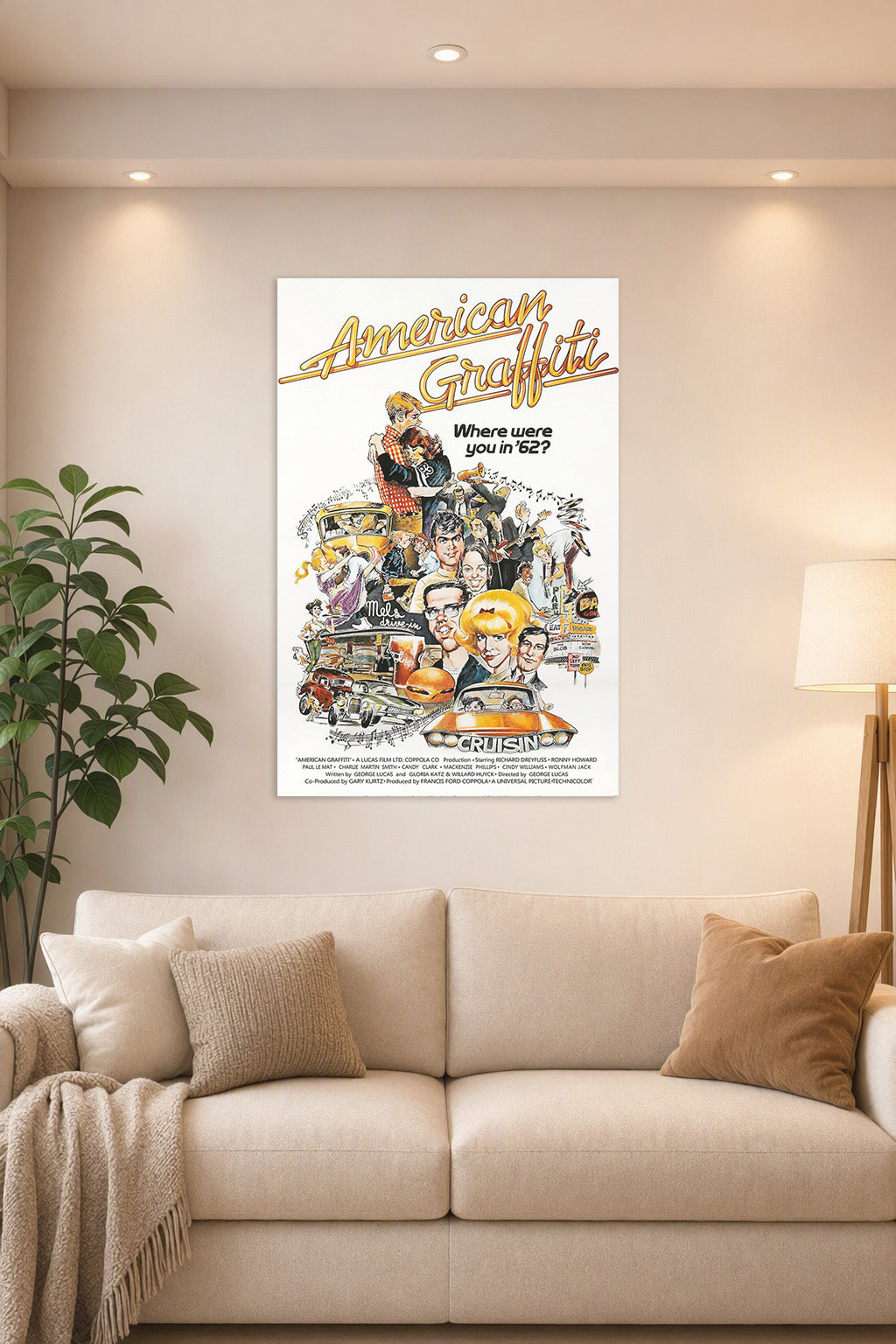 American Graffiti Movie Poster in a bright living room above a beige sofa.