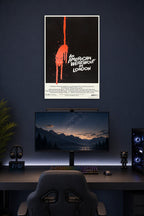An American Werewolf in London Movie Poster in a gaming desk setup above a monitor.
