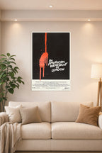 An American Werewolf in London Movie Poster in a bright living room above a beige sofa.