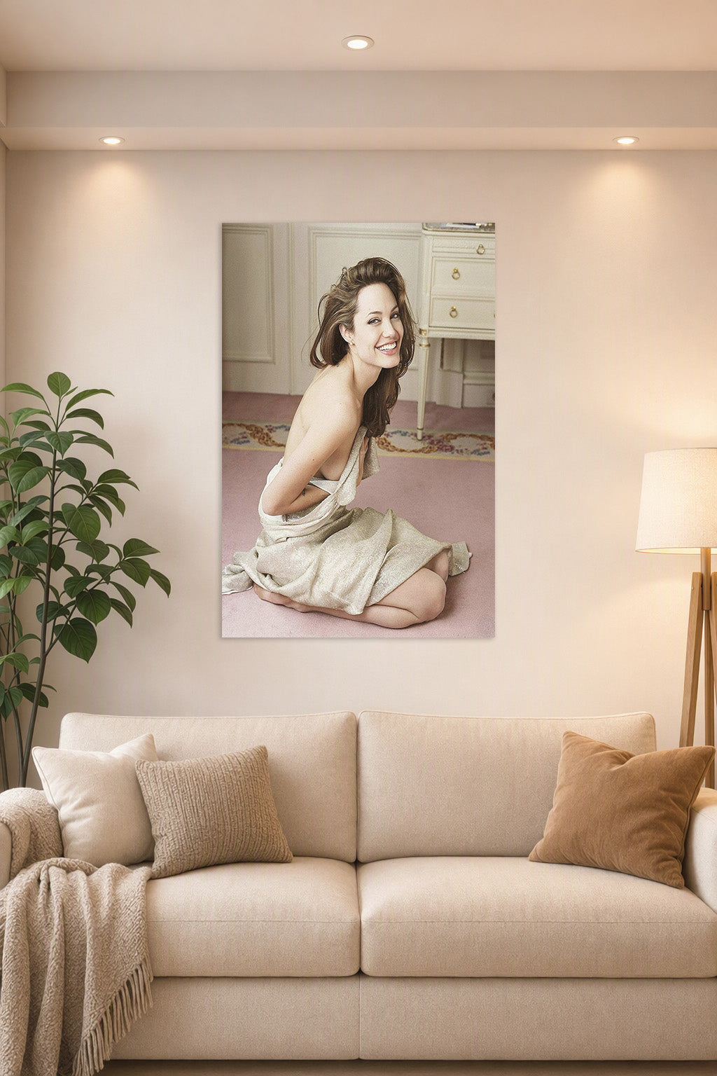 Angelina Jolie in a bright living room above a beige sofa.