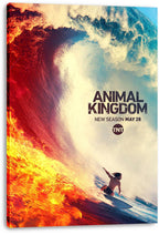 Animal Kingdom canvas wall art print presents a surfer on a board beneath a giant wave with flames in orange and blue sea.