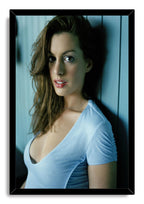 Anne Hathaway framed wall art print features a close portrait in cool blue tones, set within a glossy black rectangular frame.