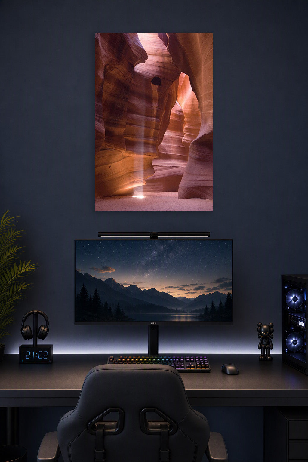 Antelope Canyon in a gaming desk setup above a monitor.