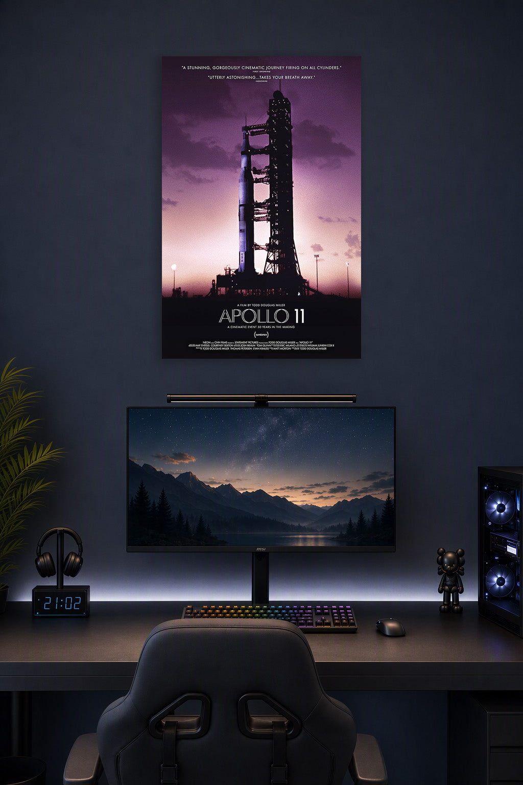 Apollo 11 Rocket Launch in a gaming desk setup above a monitor.