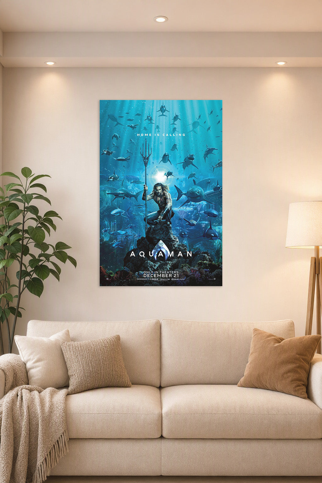 Aquaman Movie Poster in a bright living room above a beige sofa.