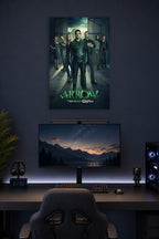 Arrow TV Series Cast in a gaming desk setup above a monitor.