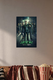 Arrow TV Series Cast in a cozy movie room above a brown sofa with popcorn.