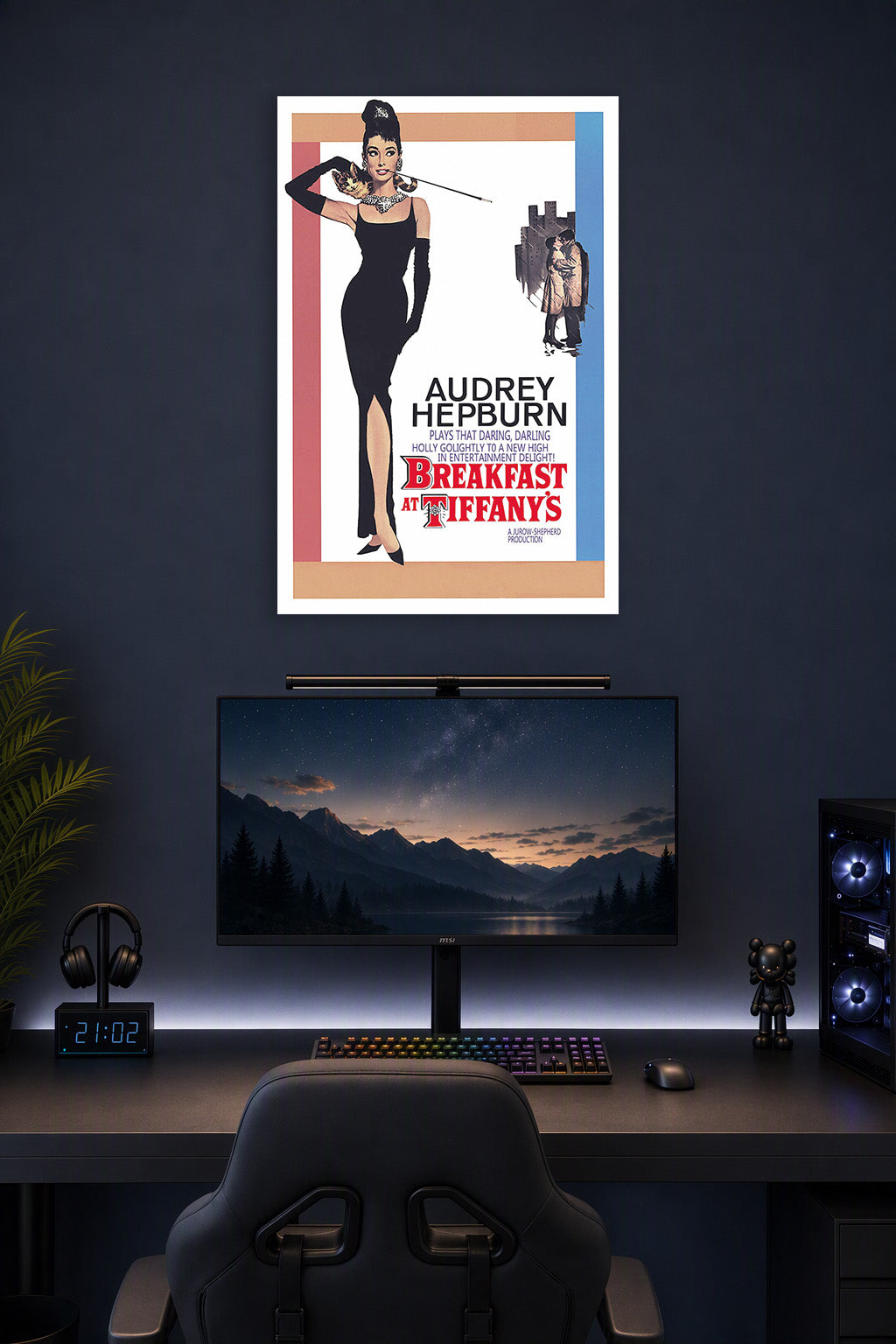 Audrey Hepburn Breakfast at Tiffany's in a gaming desk setup above a monitor.