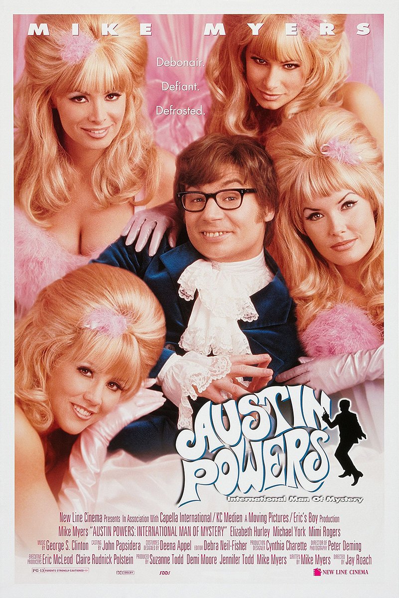 Austin Powers poster features Mike Myers in a blue velvet suit surrounded by four blonde women against a pink backdrop.