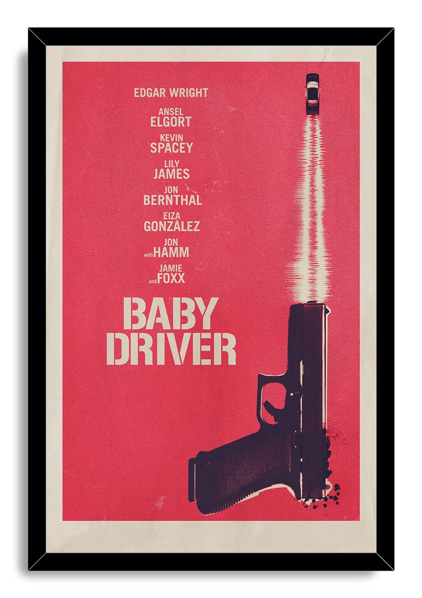 Baby Driver framed wall art print in a black frame, with bold white title text, gun silhouette, and red background.