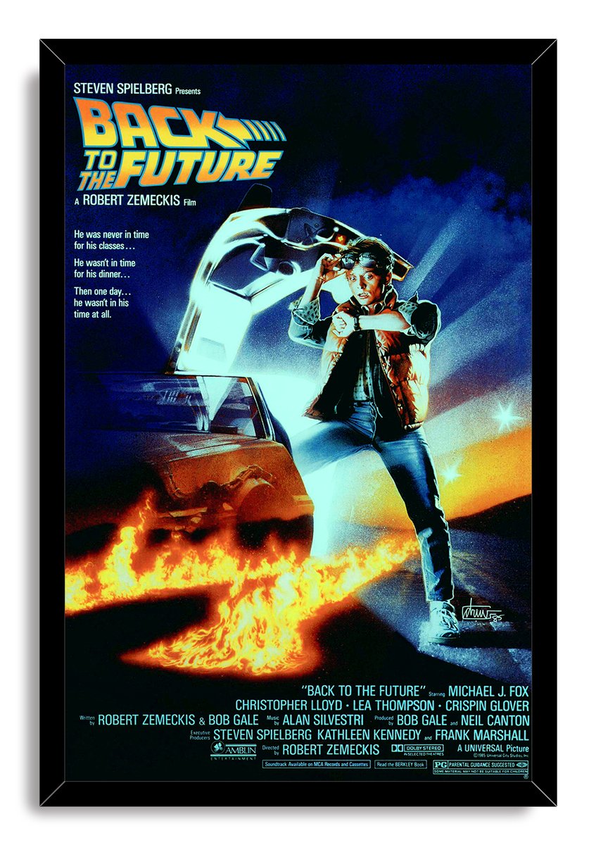 Back to the Future framed wall art print with Marty McFly and a DeLorean above bright flaming tire tracks.