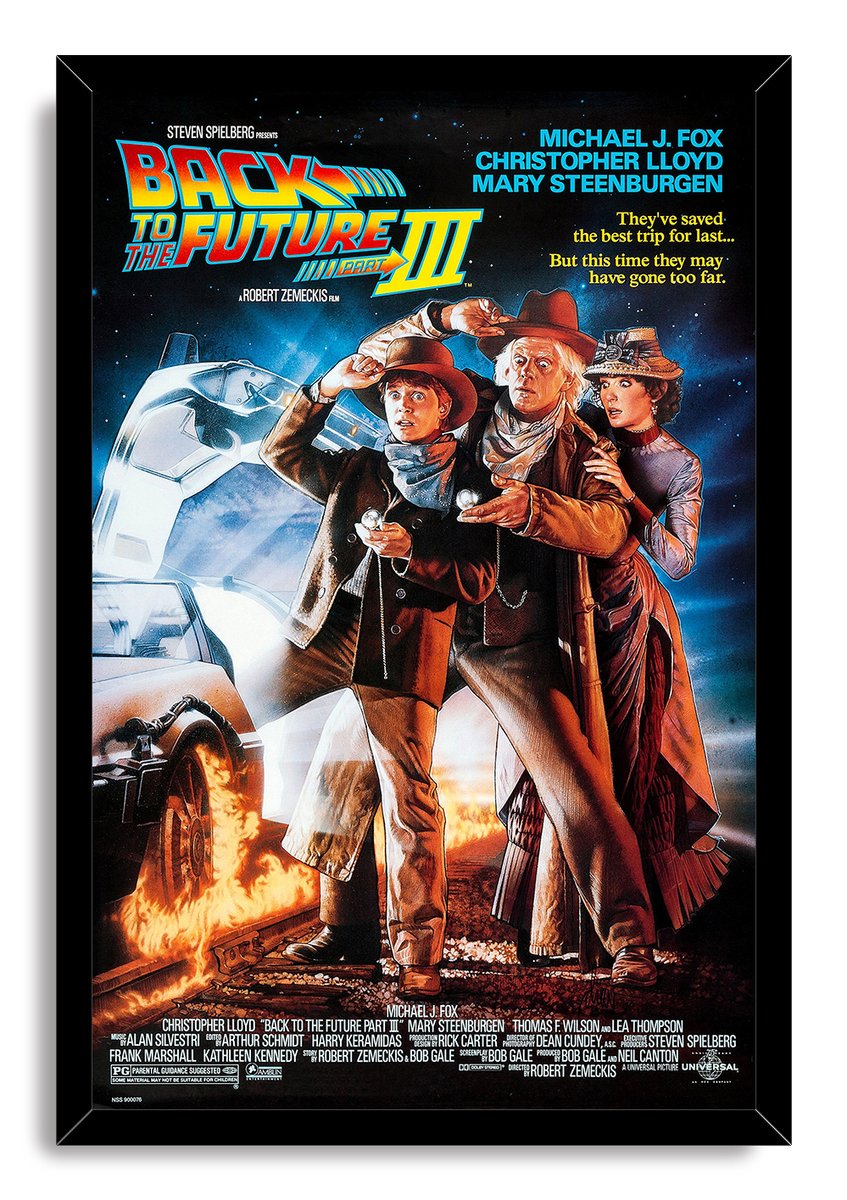 Back to the Future Part III framed wall art print with Western-clad characters, DeLorean time machine, and blazing tracks.