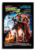 Back to the Future Part III framed wall art print with Western-clad characters, DeLorean time machine, and blazing tracks.