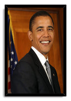 Barack Obama framed wall art print featuring his smiling formal portrait in a black frame, beside a U.S. flag.