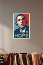 Barack Obama in a cozy movie room above a brown sofa with popcorn.