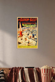 Barnum & Bailey Grand Water Circus in a cozy movie room above a brown sofa with popcorn.