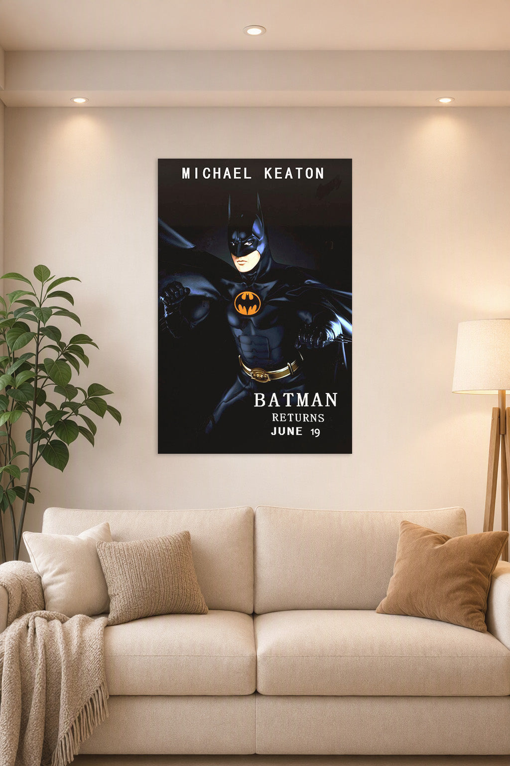 Batman Michael Keaton in a bright living room above a beige sofa.