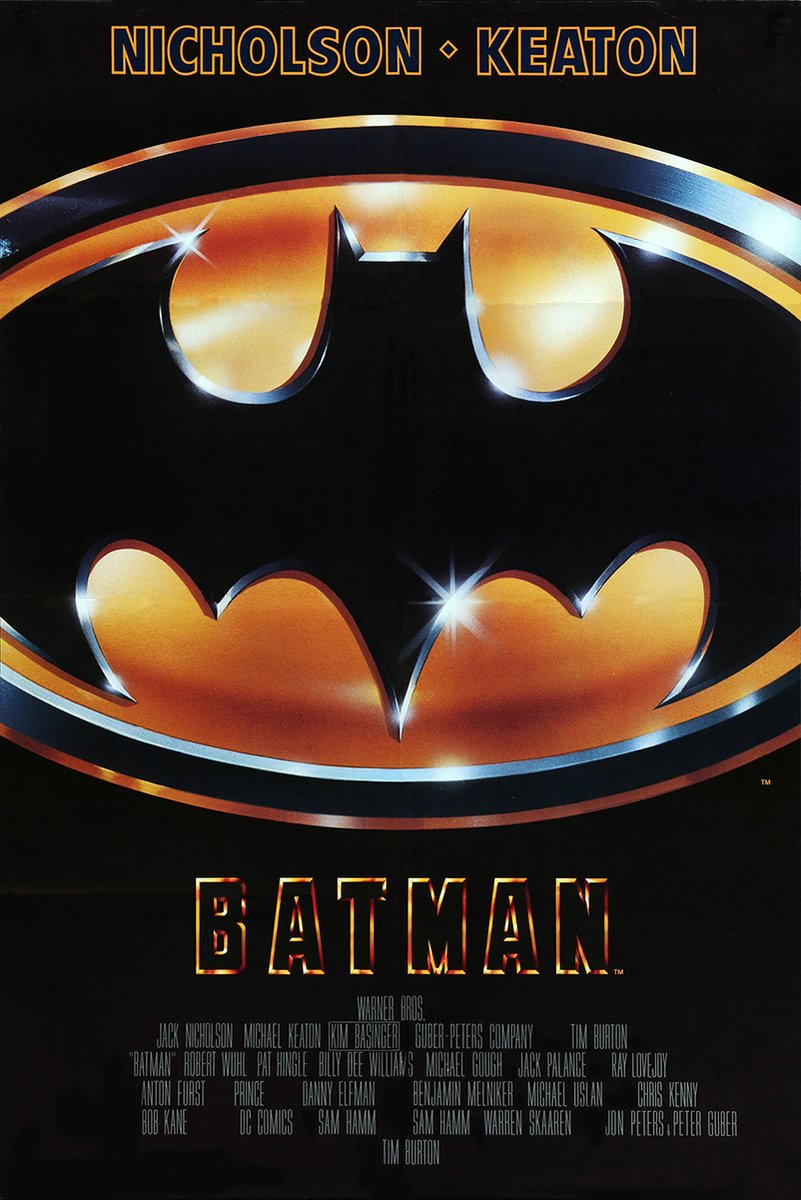 Batman movie poster features a glossy black bat emblem over a gold oval, with Nicholson, Keaton, and title text.