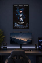 Batman Returns Movie Poster in a gaming desk setup above a monitor.